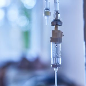 IV on the background of a hospital room, selective focus